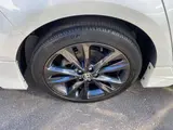 2020 Toyota Corolla Touring 1.8 Hybrid WxB E-Four 4WD Pearl Van for sale, Japanese used car export - photo 48 of 51 | GULJI TRADERS