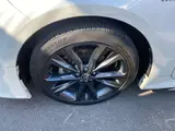 2020 Toyota Corolla Touring 1.8 Hybrid WxB E-Four 4WD Pearl Van for sale, Japanese used car export - photo 50 of 51 | GULJI TRADERS