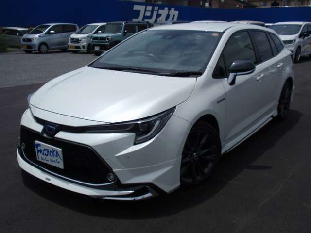 2020 Toyota Corolla Touring 1.8 Hybrid WxB - photo 1 2020 Toyota Corolla Touring 1.8 Hybrid WxB Van for sale, Japanese used car export - photo 1 of 55 | GULJI TRADERS