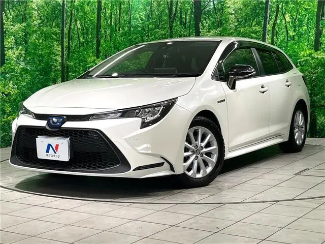 2020 Toyota Corolla Touring Hybrid S Pearl Van for sale, Japanese used car export - photo 1 of 30 | GULJI TRADERS