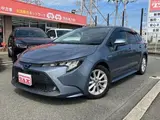 2020 Toyota Corolla Touring Hybrid S Gray Van for sale, Japanese used car export - photo 1 of 31 | GULJI TRADERS