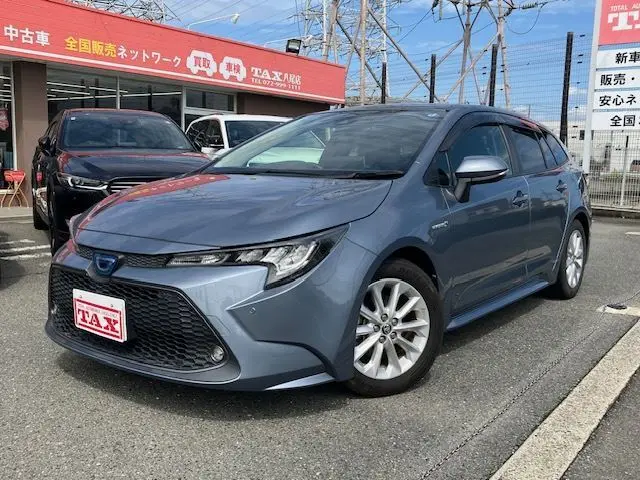 2020 Toyota Corolla Touring Hybrid S - photo 1 2020 Toyota Corolla Touring Hybrid S Gray Van for sale, Japanese used car export - photo 1 of 31 | GULJI TRADERS