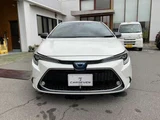 2020 Toyota Corolla Touring 1.8 Hybrid WxB E-Four 4WD Van for sale, Japanese used car export - photo 2 of 35 | GULJI TRADERS