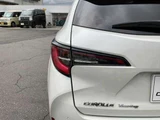 2020 Toyota Corolla Touring 1.8 Hybrid WxB E-Four 4WD Van for sale, Japanese used car export - photo 30 of 35 | GULJI TRADERS