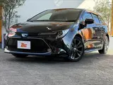 2020 Toyota Corolla Touring HYBRID WXB ★ 9-inch DA ★ BSM ★ HUD ★ Seat Heater Black Van for sale, Japanese used car export - photo 26 of 50 | GULJI TRADERS