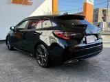 2020 Toyota Corolla Touring HYBRID WXB ★ 9-inch DA ★ BSM ★ HUD ★ Seat Heater Black Van for sale, Japanese used car export - photo 33 of 50 | GULJI TRADERS