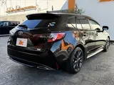 2020 Toyota Corolla Touring HYBRID WXB ★ 9-inch DA ★ BSM ★ HUD ★ Seat Heater Black Van for sale, Japanese used car export - photo 35 of 50 | GULJI TRADERS