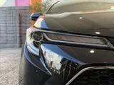 2020 Toyota Corolla Touring HYBRID WXB ★ 9-inch DA ★ BSM ★ HUD ★ Seat Heater Black Van for sale, Japanese used car export - photo 38 of 50 | GULJI TRADERS