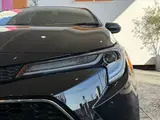 2020 Toyota Corolla Touring HYBRID WXB ★ 9-inch DA ★ BSM ★ HUD ★ Seat Heater Black Van for sale, Japanese used car export - photo 39 of 50 | GULJI TRADERS