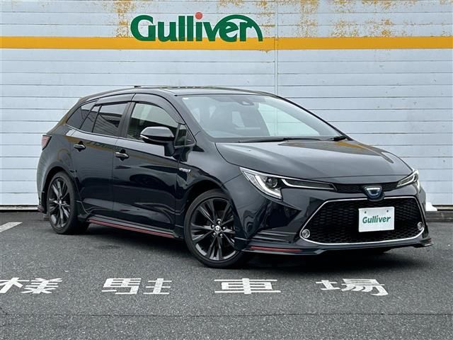 2020 Toyota Corolla Touring Hybrid - photo 1 2020 Toyota Corolla Touring Hybrid Van for sale, Japanese used car export - photo 1 of 22 | GULJI TRADERS