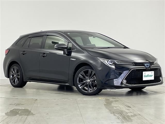 2020 Toyota Corolla Touring Hybrid 4WD Van for sale, Japanese used car export - photo 1 of 24 | GULJI TRADERS