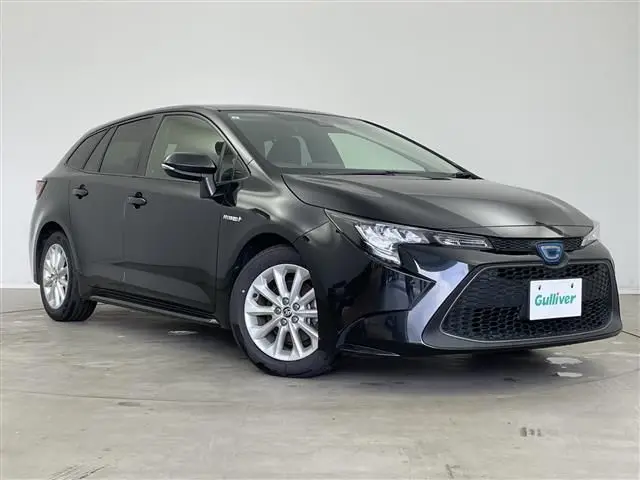 2020 Toyota Corolla Touring Hybrid S 4WD - photo 1 2020 Toyota Corolla Touring Hybrid S 4WD Black Van for sale, Japanese used car export - photo 1 of 24 | GULJI TRADERS