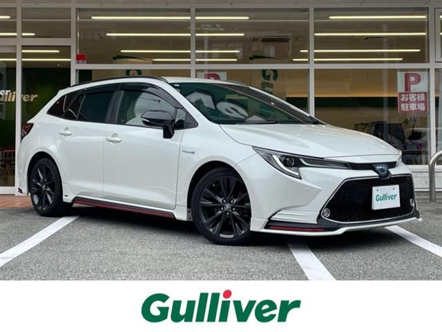 2020 Toyota Corolla Touring Hybrid 4WD Van for sale, Japanese used car export - photo 1 of 24 | GULJI TRADERS