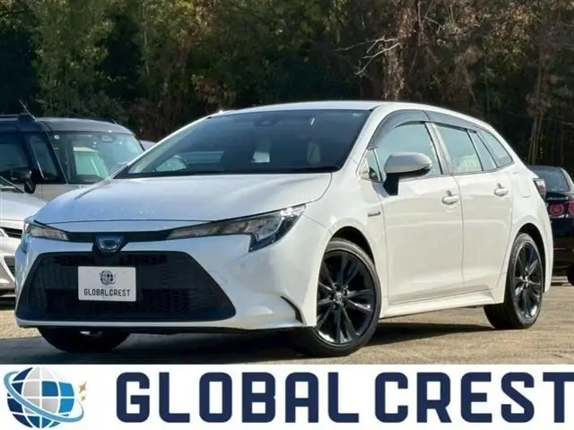 2020 Toyota Corolla Touring 1.8HV G-X pure 17AW - photo 1 2020 Toyota Corolla Touring 1.8HV G-X pure 17AW White Van for sale, Japanese used car export - photo 1 of 30 | GULJI TRADERS