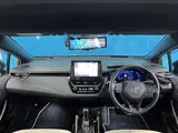 2020 Toyota Corolla Touring 1.8 HYBRID WxB Pearl Van for sale, Japanese used car export - photo 6 of 30 | GULJI TRADERS
