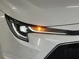 2020 Toyota Corolla Touring 1.8 HYBRID WxB Pearl Van for sale, Japanese used car export - photo 24 of 30 | GULJI TRADERS