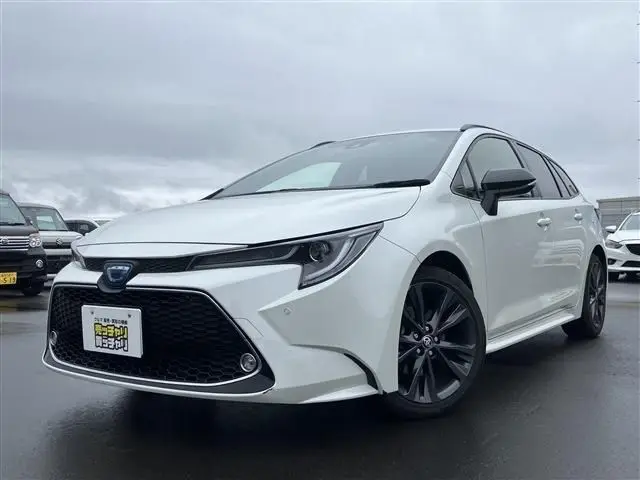 2020 Toyota Corolla Touring Hybrid Double By - photo 1 2020 Toyota Corolla Touring Hybrid Double By Pearl Van for sale, Japanese used car export - photo 1 of 30 | GULJI TRADERS