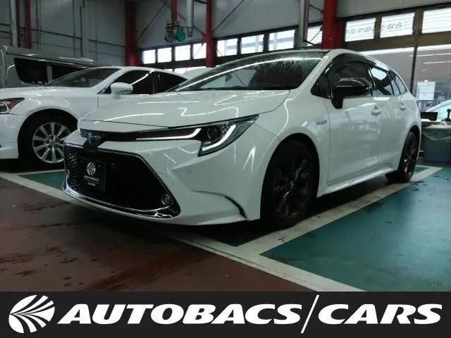 2020 Toyota Corolla Touring HYBRIDW×B 2WD - photo 1 2020 Toyota Corolla Touring HYBRIDW×B 2WD Pearl Van for sale, Japanese used car export - photo 1 of 3 | GULJI TRADERS