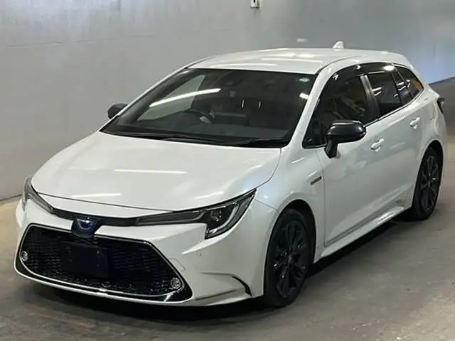 2020 Toyota Corolla Touring Hybrid Double By - photo 1 2020 Toyota Corolla Touring Hybrid Double By Pearl Van for sale, Japanese used car export - photo 1 of 3 | GULJI TRADERS