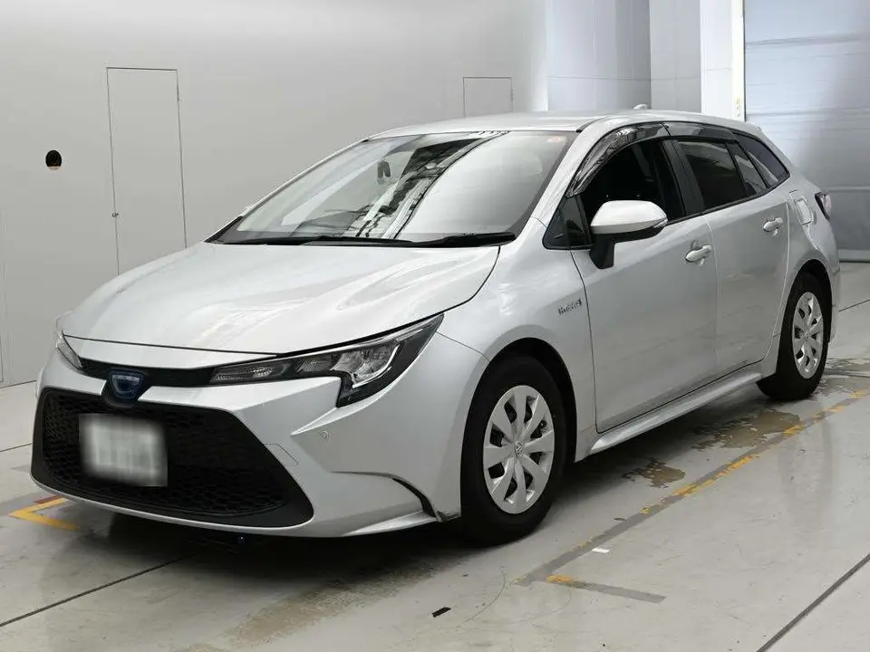 2020 Toyota Corolla Touring Hybrid G-X Plus - photo 1 2020 Toyota Corolla Touring Hybrid G-X Plus Silver Van for sale, Japanese used car export - photo 1 of 12 | GULJI TRADERS
