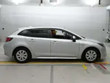 2020 Toyota Corolla Touring Hybrid G-X Plus Silver Van for sale, Japanese used car export - photo 3 of 12 | GULJI TRADERS