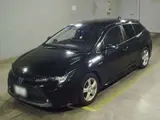 2020 Toyota Corolla Touring Hybrid S 4WD Black Van for sale, Japanese used car export - photo 1 of 12 | GULJI TRADERS