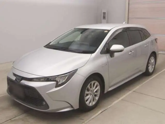 2020 Toyota Corolla Touring Hybrid S Silver Van for sale, Japanese used car export - photo 1 of 9 | GULJI TRADERS