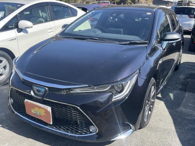 2020 Toyota Corolla Touring 1.8 Hybrid WxB - photo 1 2020 Toyota Corolla Touring 1.8 Hybrid WxB Van for sale, Japanese used car export - photo 1 of 13 | GULJI TRADERS