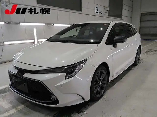 2020 Toyota Corolla Touring 4WD Hybrid Double WxB Pearl Van for sale, Japanese used car export - photo 1 of 10 | GULJI TRADERS