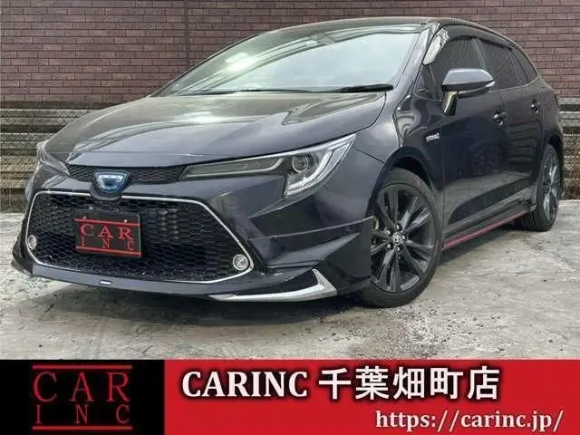 2020 Toyota Corolla Touring Hybrid Double B - photo 1 2020 Toyota Corolla Touring Hybrid Double B Other Van for sale, Japanese used car export - photo 1 of 9 | GULJI TRADERS
