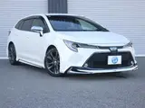 2020 Toyota Corolla Touring Hybrid WxB Modellista Air Pearl Van for sale, Japanese used car export - photo 1 of 9 | GULJI TRADERS