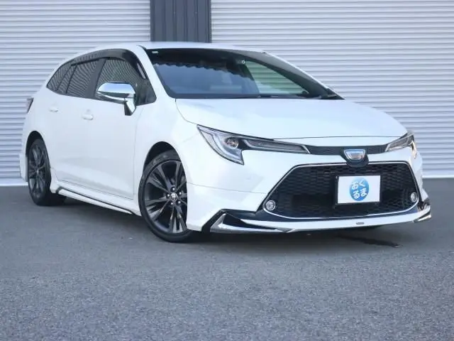 2020 Toyota Corolla Touring Hybrid WxB Modellista Air - photo 1 2020 Toyota Corolla Touring Hybrid WxB Modellista Air Pearl Van for sale, Japanese used car export - photo 1 of 9 | GULJI TRADERS