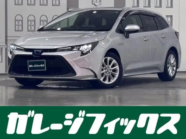 2020 Toyota Corolla Touring Hybrid S Silver Van for sale, Japanese used car export - photo 1 of 9 | GULJI TRADERS