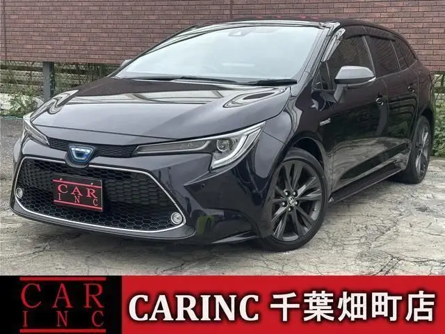 2020 Toyota Corolla Touring Hybrid Double By - photo 1 2020 Toyota Corolla Touring Hybrid Double By Purple Van for sale, Japanese used car export - photo 1 of 9 | GULJI TRADERS