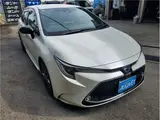 2021 Toyota Corolla Touring Hybrid Double B Pearl Van for sale, Japanese used car export - photo 1 of 53 | GULJI TRADERS