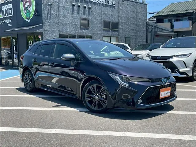 2021 Toyota Corolla Touring Hybrid Double WBY, One Owner/Rear Camera/ETC - photo 1 2021 Toyota Corolla Touring Hybrid Double WBY, One Owner/Rear Camera/ETC Black Van for sale, Japanese used car export - photo 1 of 62 | GULJI TRADERS