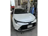 2021 Toyota Corolla Touring Hybrid WXB Pearl Van for sale, Japanese used car export - photo 1 of 16 | GULJI TRADERS