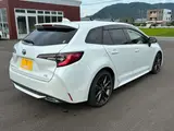 2021 Toyota Corolla Touring 1.8 Hybrid WxB White Van for sale, Japanese used car export - photo 7 of 49 | GULJI TRADERS