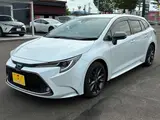 2021 Toyota Corolla Touring 1.8 Hybrid WxB White Van for sale, Japanese used car export - photo 11 of 49 | GULJI TRADERS