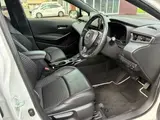 2021 Toyota Corolla Touring 1.8 Hybrid WxB White Van for sale, Japanese used car export - photo 13 of 49 | GULJI TRADERS