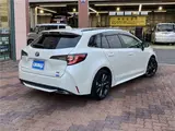 2021 Toyota Corolla Touring Hybrid WXB Pearl Van for sale, Japanese used car export - photo 2 of 29 | GULJI TRADERS