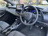 2021 Toyota Corolla Touring Hybrid WXB Pearl Van for sale, Japanese used car export - photo 12 of 29 | GULJI TRADERS