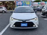 2021 Toyota Corolla Touring Hybrid WXB Pearl Van for sale, Japanese used car export - photo 21 of 29 | GULJI TRADERS