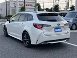 2021 Toyota Corolla Touring Hybrid WXB Pearl Van for sale, Japanese used car export - photo 25 of 29 | GULJI TRADERS