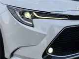 2021 Toyota Corolla Touring Hybrid WXB Pearl Van for sale, Japanese used car export - photo 26 of 29 | GULJI TRADERS