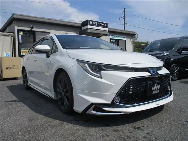 2021 Toyota Corolla Touring WXB 4WD Modellista Aero Genuine Navigation System Pearl Van for sale, Japanese used car export - photo 1 of 61 | GULJI TRADERS