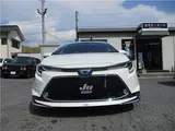 2021 Toyota Corolla Touring WXB 4WD Modellista Aero Genuine Navigation System Pearl Van for sale, Japanese used car export - photo 2 of 61 | GULJI TRADERS
