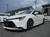 2021 Toyota Corolla Touring WXB 4WD Modellista Aero Genuine Navigation System Pearl Van for sale, Japanese used car export - photo 3 of 61 | GULJI TRADERS