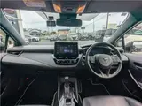 2021 Toyota Corolla Touring Hybrid Double WBY ★ Modellista Aero ★ Genuine Navigation System ★ Pearl Van for sale, Japanese used car export - photo 2 of 37 | GULJI TRADERS
