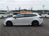 2021 Toyota Corolla Touring Hybrid Double WBY ★ Modellista Aero ★ Genuine Navigation System ★ Pearl Van for sale, Japanese used car export - photo 4 of 37 | GULJI TRADERS